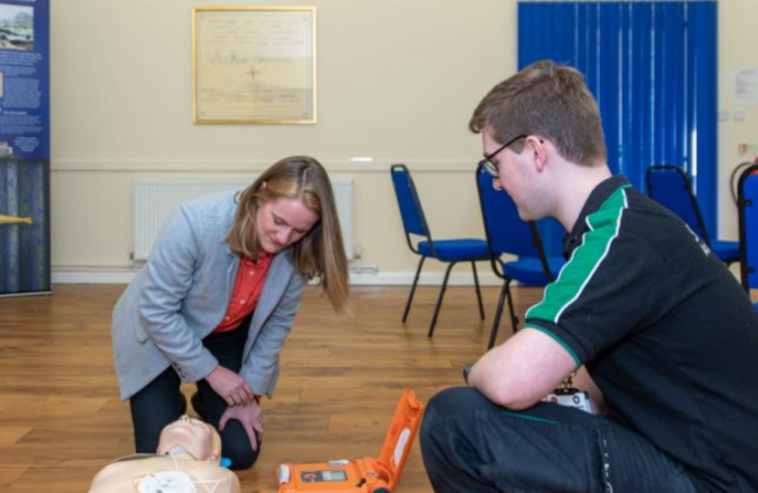 Virginia Crosbie using a defib